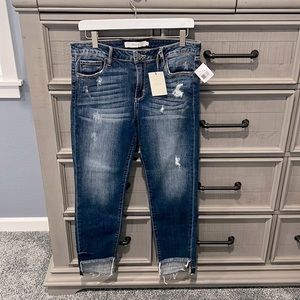 New Hidden distressed, frayed hem skinny jean.